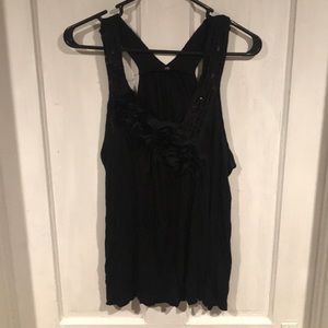 Black tank with floural accent at bust